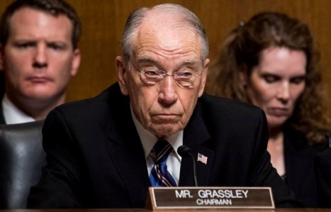 WASHINGTON, DC - SEPTEMBER 27: Sen. Chuck Grassley, R-Iowa, listens as Dr. Christine Blasey Ford testifies during the Senate Judiciary Committee hearing on the nomination of Brett M. Kavanaugh to be an associate justice of the Supreme Court of the United States on Capitol Hill September 27, 2018 in Washington, DC. A professor at Palo Alto University and a research psychologist at the Stanford University School of Medicine, Ford has accused Supreme Court nominee Judge Brett Kavanaugh of sexually assaulting her during a party in 1982 when they were high school students in suburban Maryland. (Photo By Tom Williams-Pool/Getty Images)