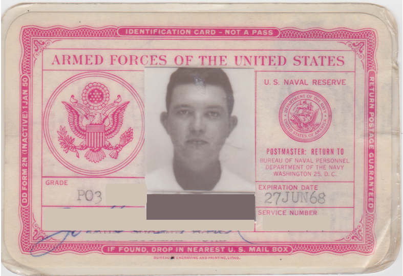 A laminated, yellowed armed forces of the united states identification card printed in pink ink. In the center is a black and white picture of a man staring directly at the camera.